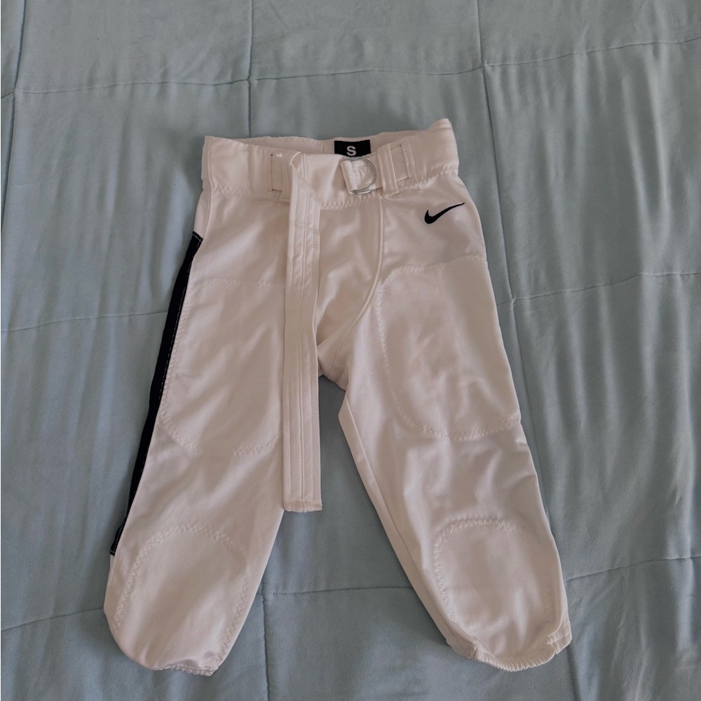 white Nike Dri-FIT youth football pants